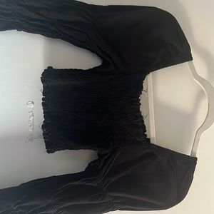 This is a cute black flared ruffle summer top! Looks cute with anything.💗